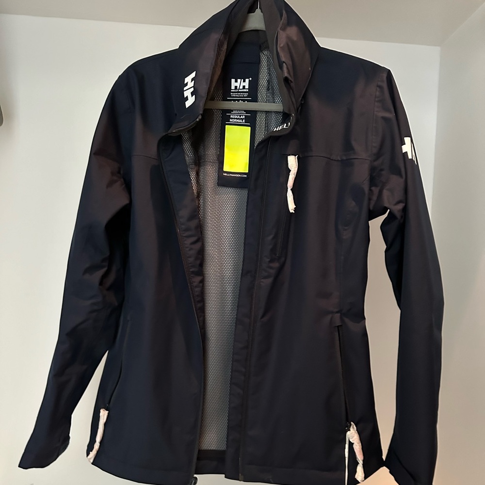 Helly Hansen women’s crew sailing jacket. Navy Blue- New With Tags NWT